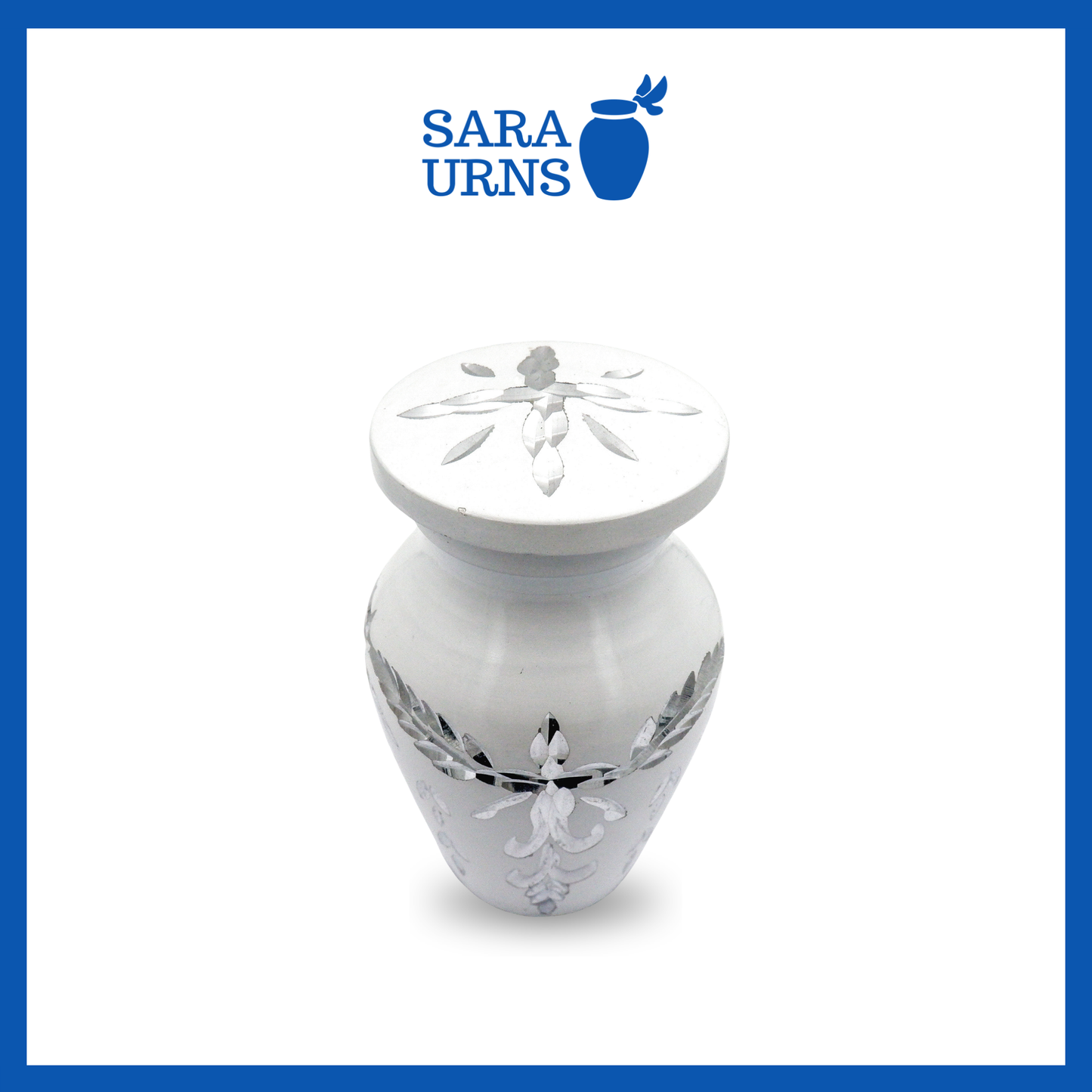 A higher angle of a white aluminum metal keepsake urn with an engraved gem-like design over a white background.