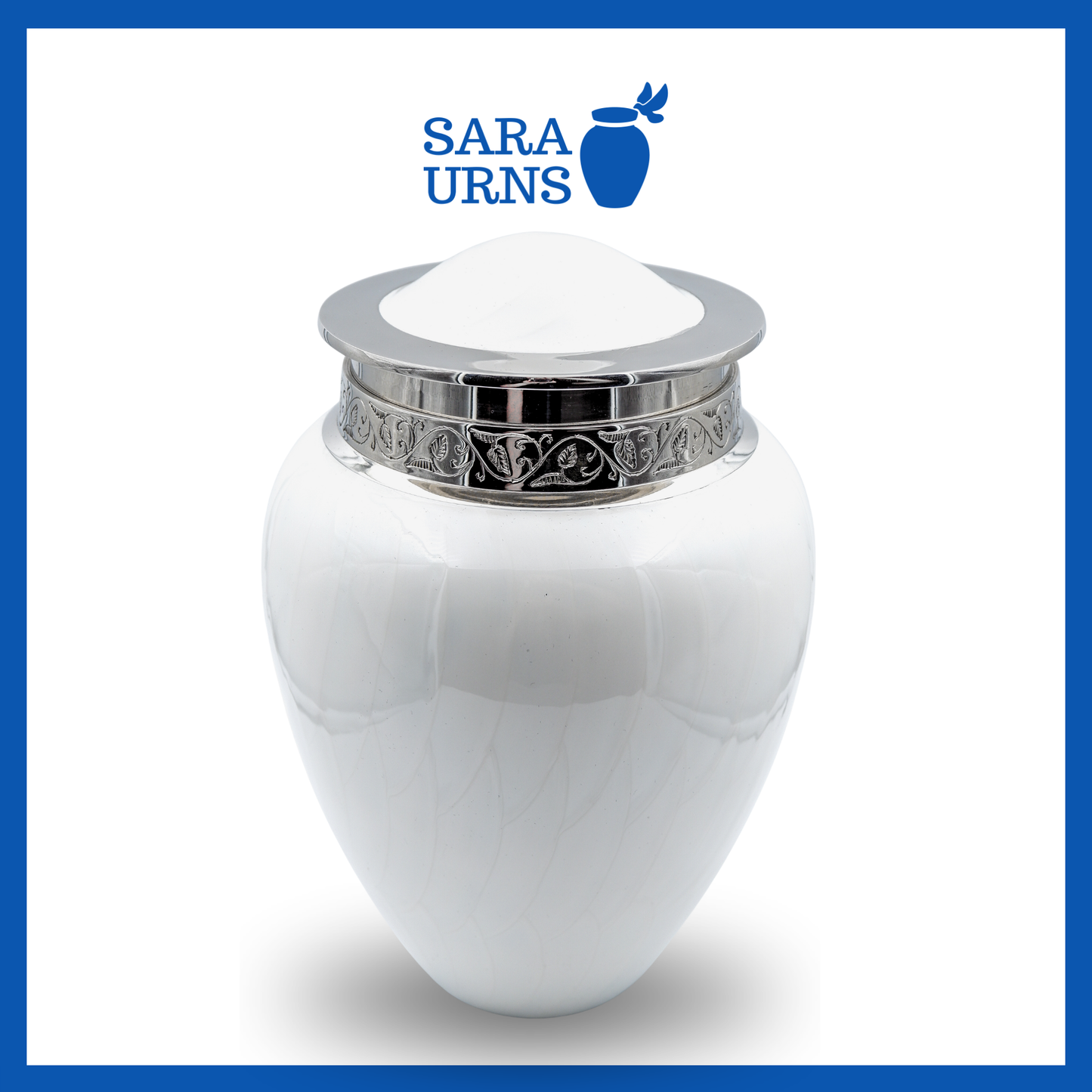 A higher angle of a white polished brass metal urn with an enamel finish and silver hand-etched details over a white background.