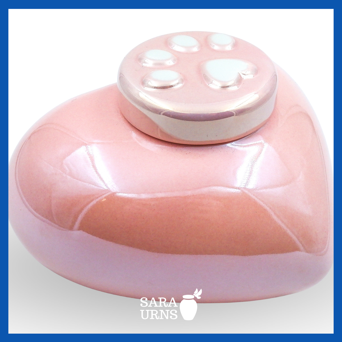 A higher angle of a heart-shaped pink ceramic pet urn with a pearly finish.