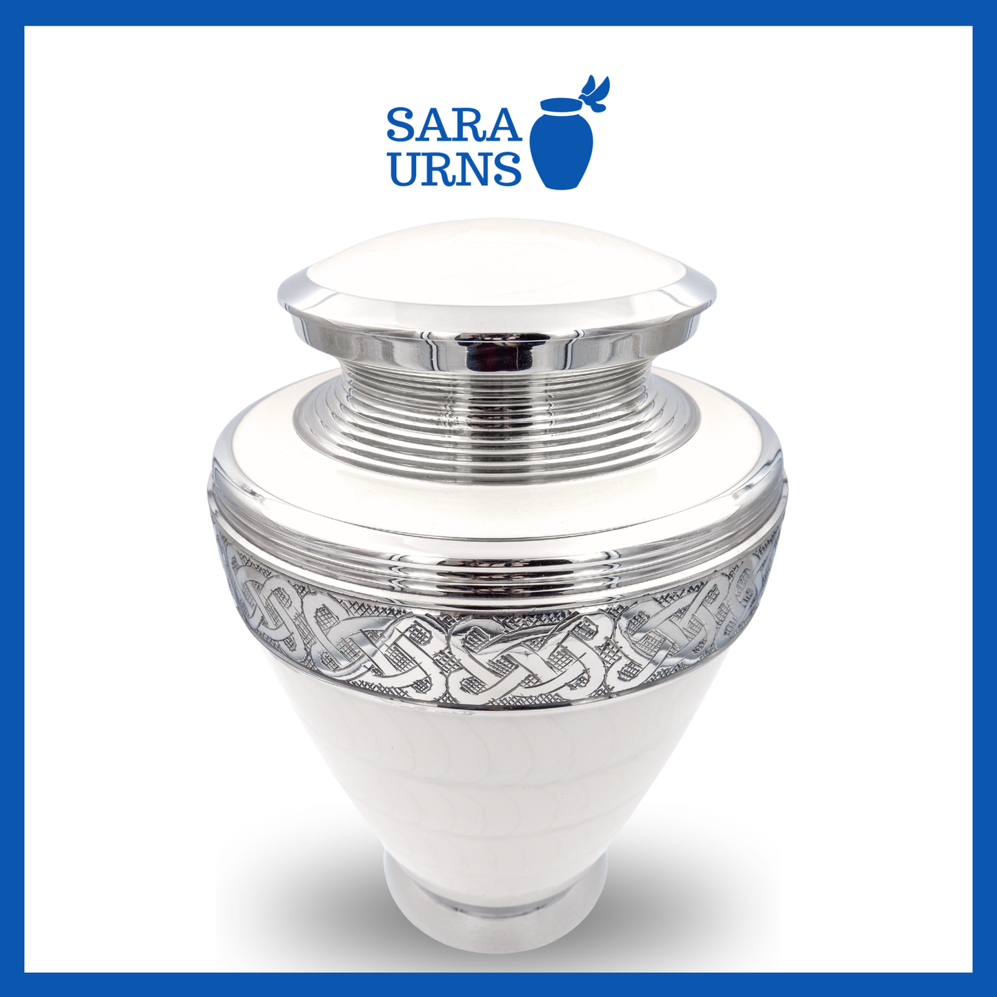 A higher angle of a white polished brass metal urn with silver hand-etched knot details over a white background.