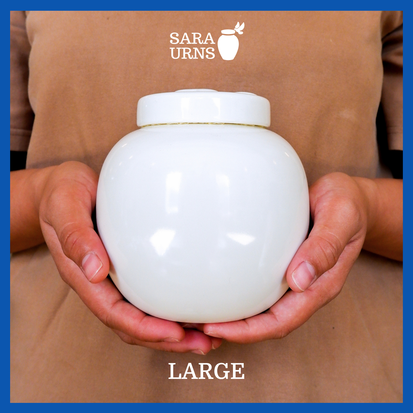A presentation of a large, white polished ceramic pet urn held by an adult woman with two palms.