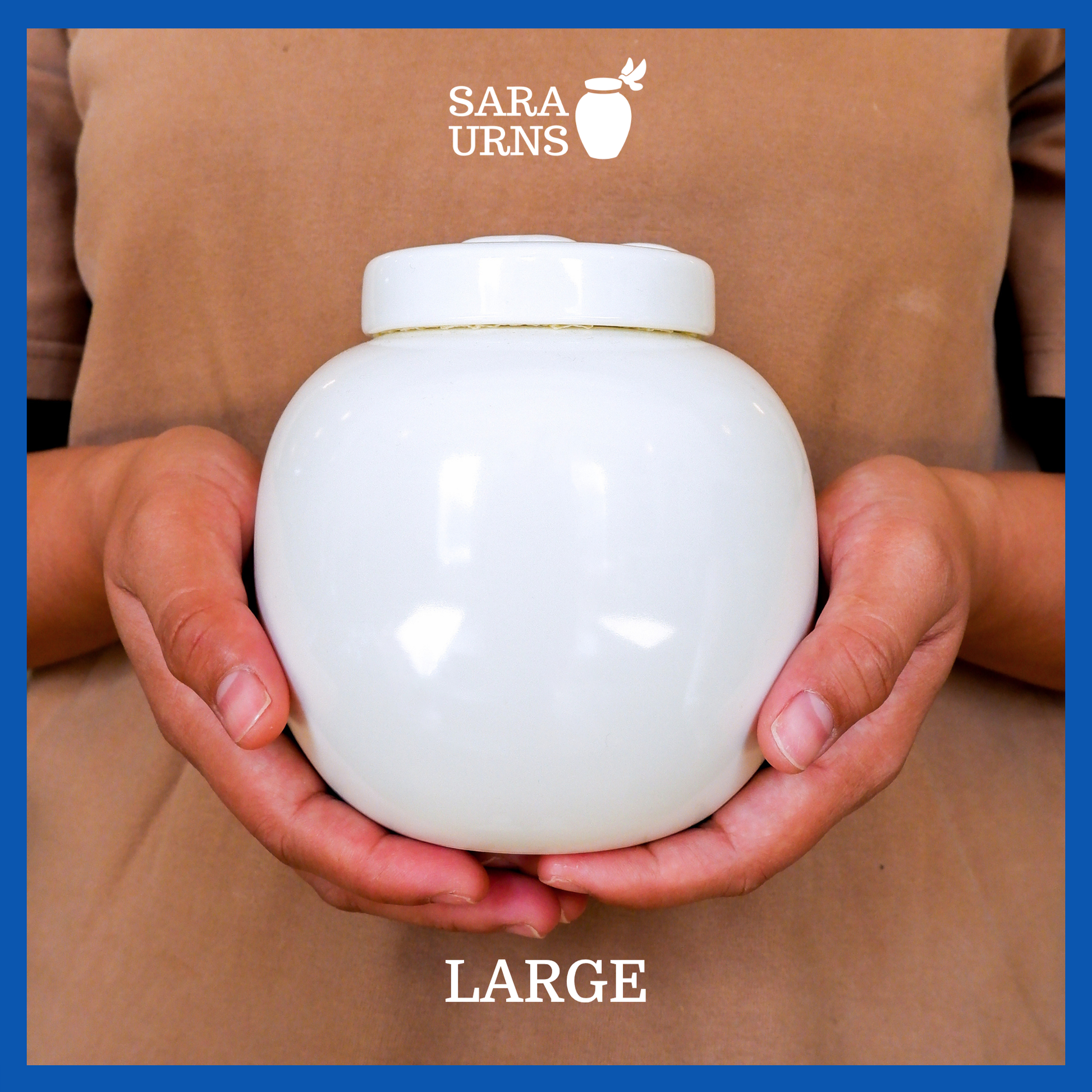 A presentation of a large, white polished ceramic pet urn held by an adult woman with two palms.