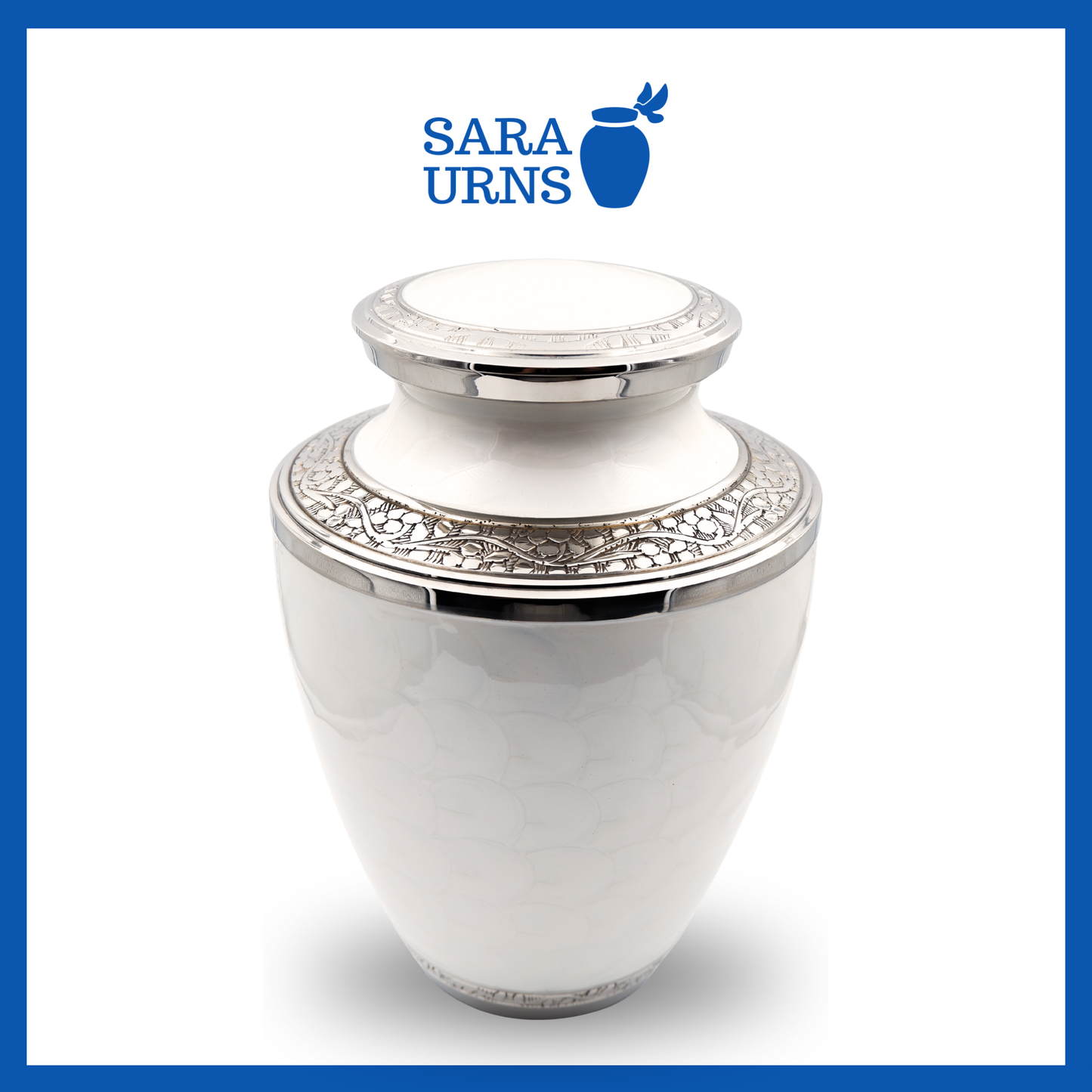 A higher angle of a white polished brass metal urn with an enamel finish and hand-etched details over a white background.