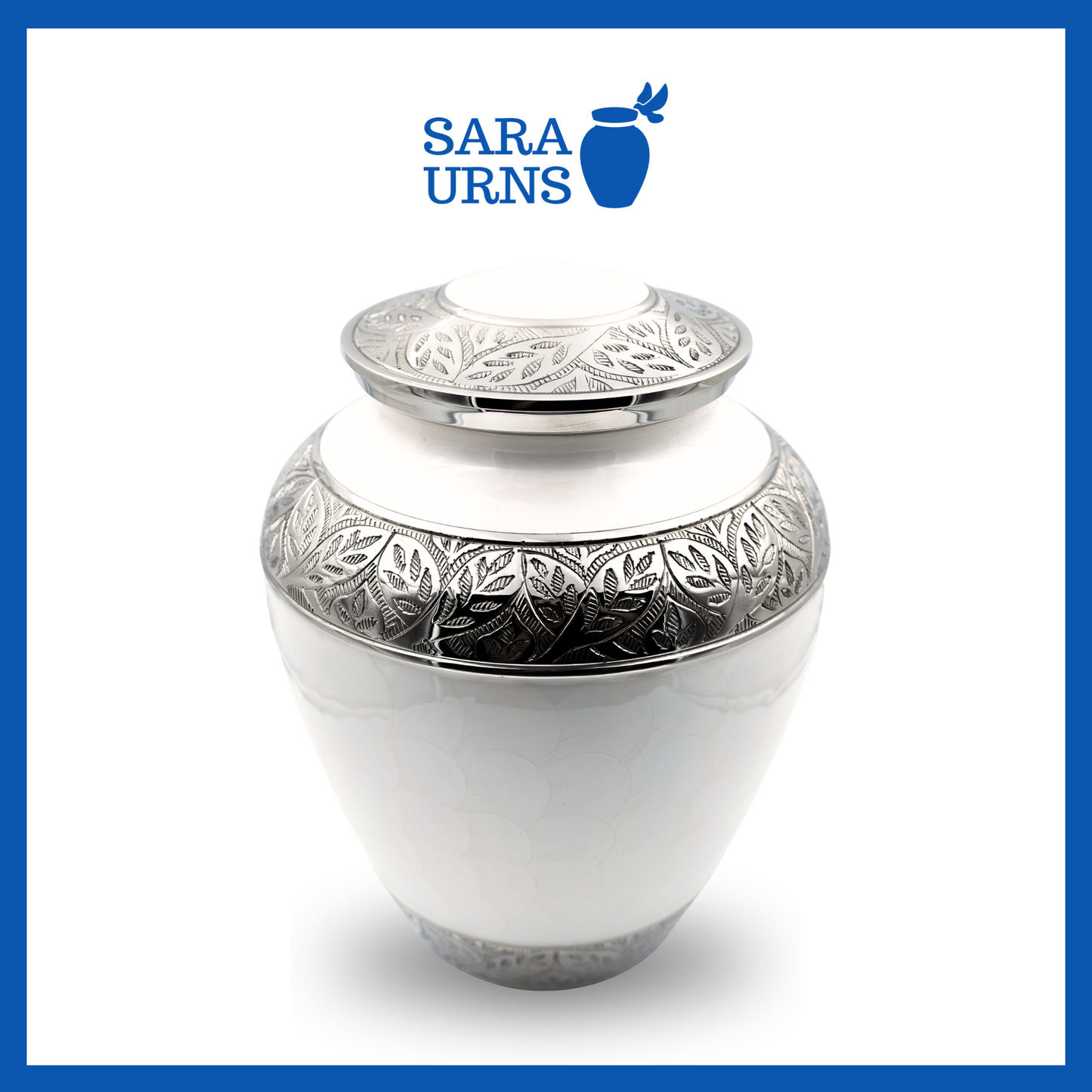 A higher angle of a white polished brass metal urn with an enamel finish and hand-etched details over a white background.