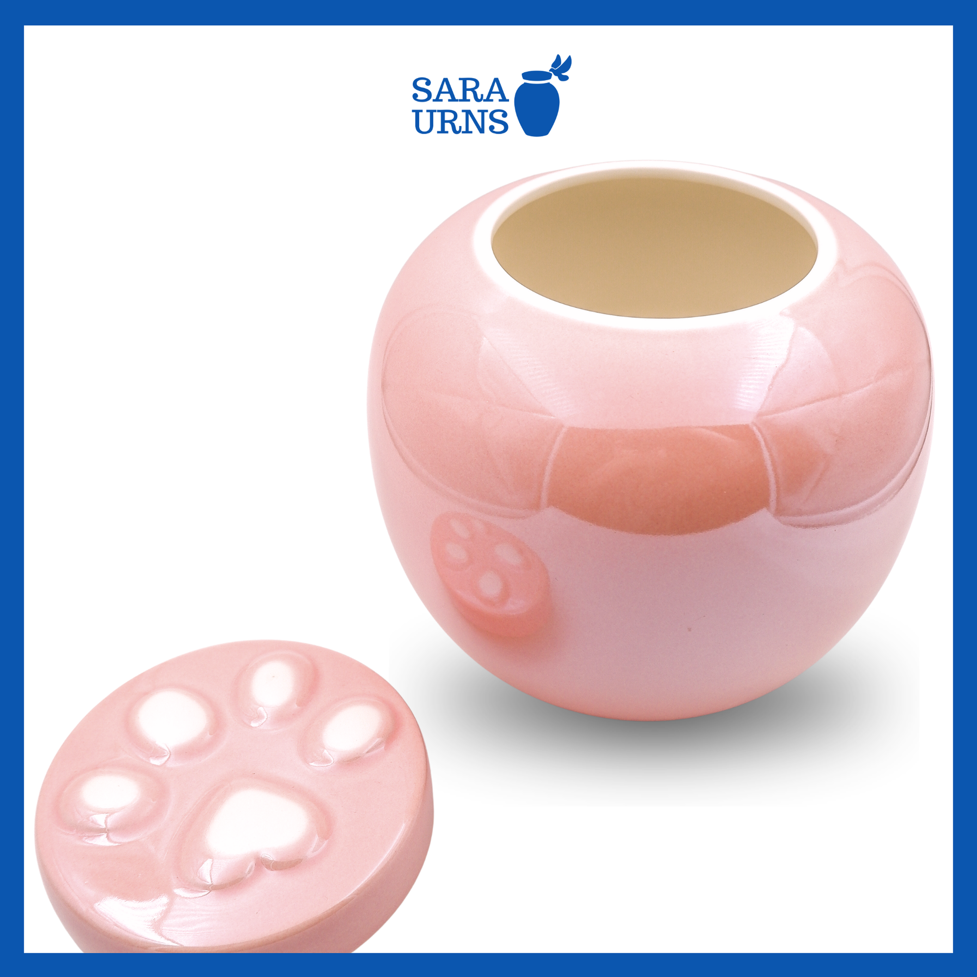 An open pink ceramic pet urn with a pearly finish with its lid placed beside it.