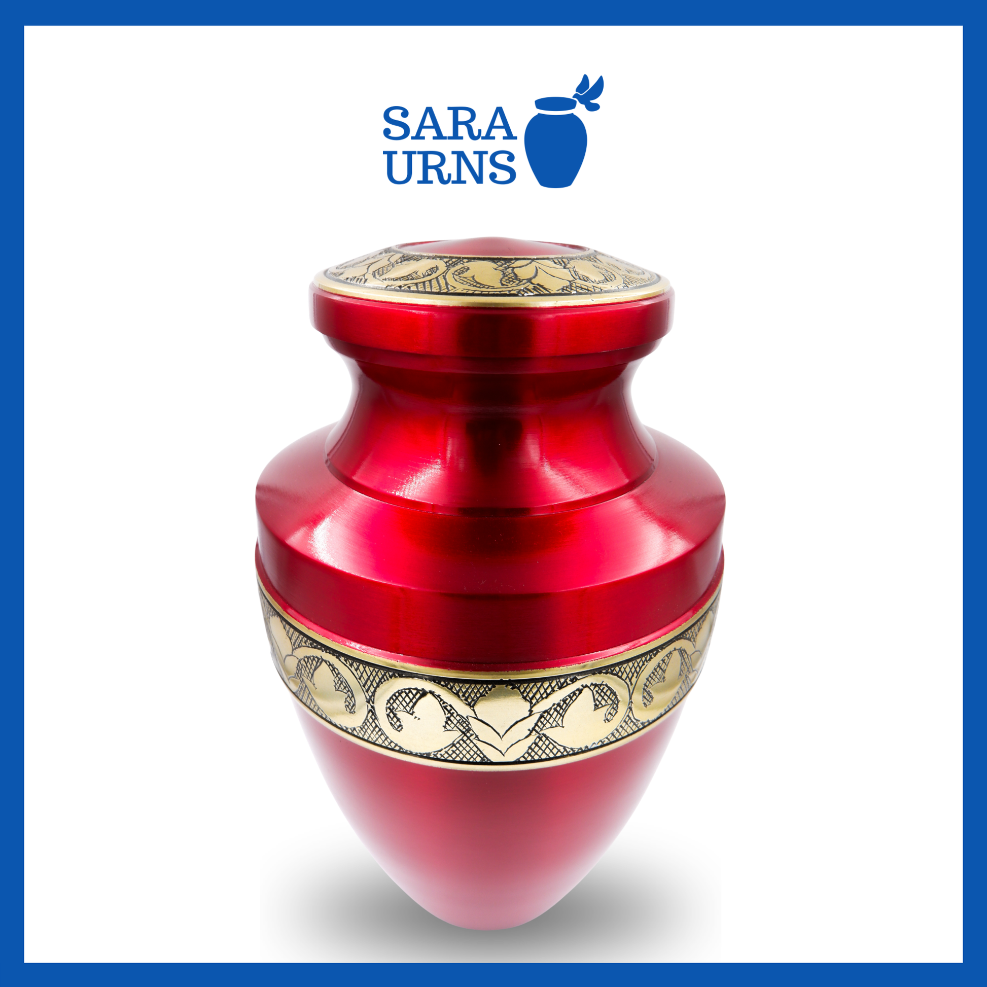A red polished brass metal urn with golden hand-etched details across the lid and body over a white background.