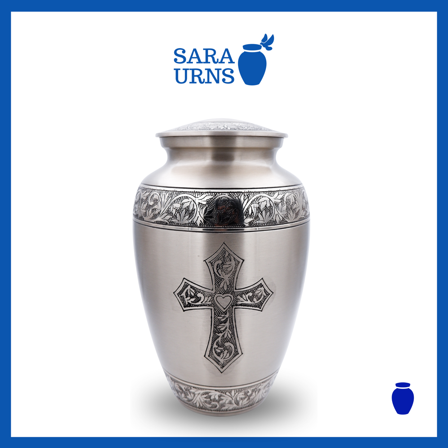 A silver polished brass metal urn with a hand-etched holy cross over a white background.
