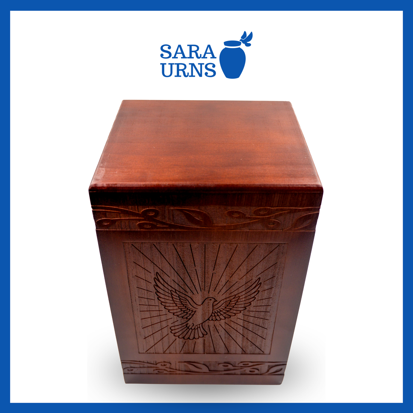 A second, higher angle of a brown pine wooden urn with an intricate engraving of a dove over a white background.