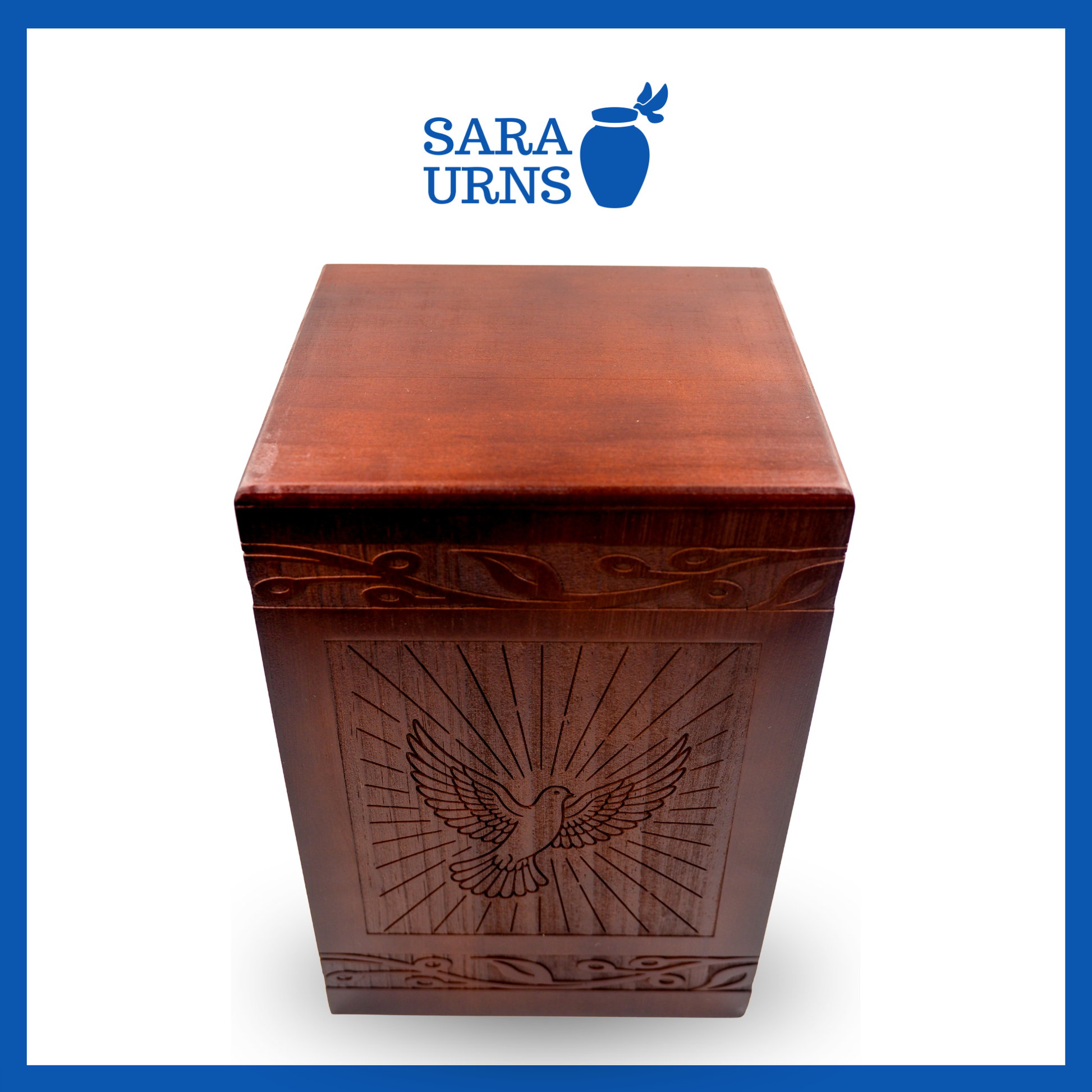 A second, higher angle of a brown pine wooden urn with an intricate engraving of a dove over a white background.