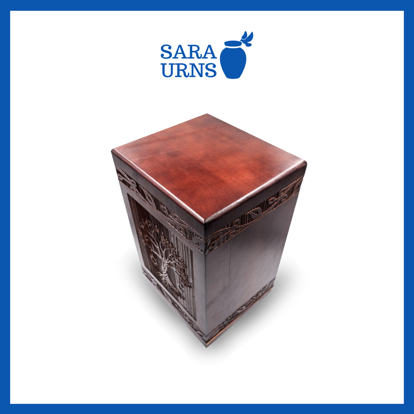 A second, higher angle of a brown pine wooden keepsake urn with an intricate engraving of the tree of life over a white background.