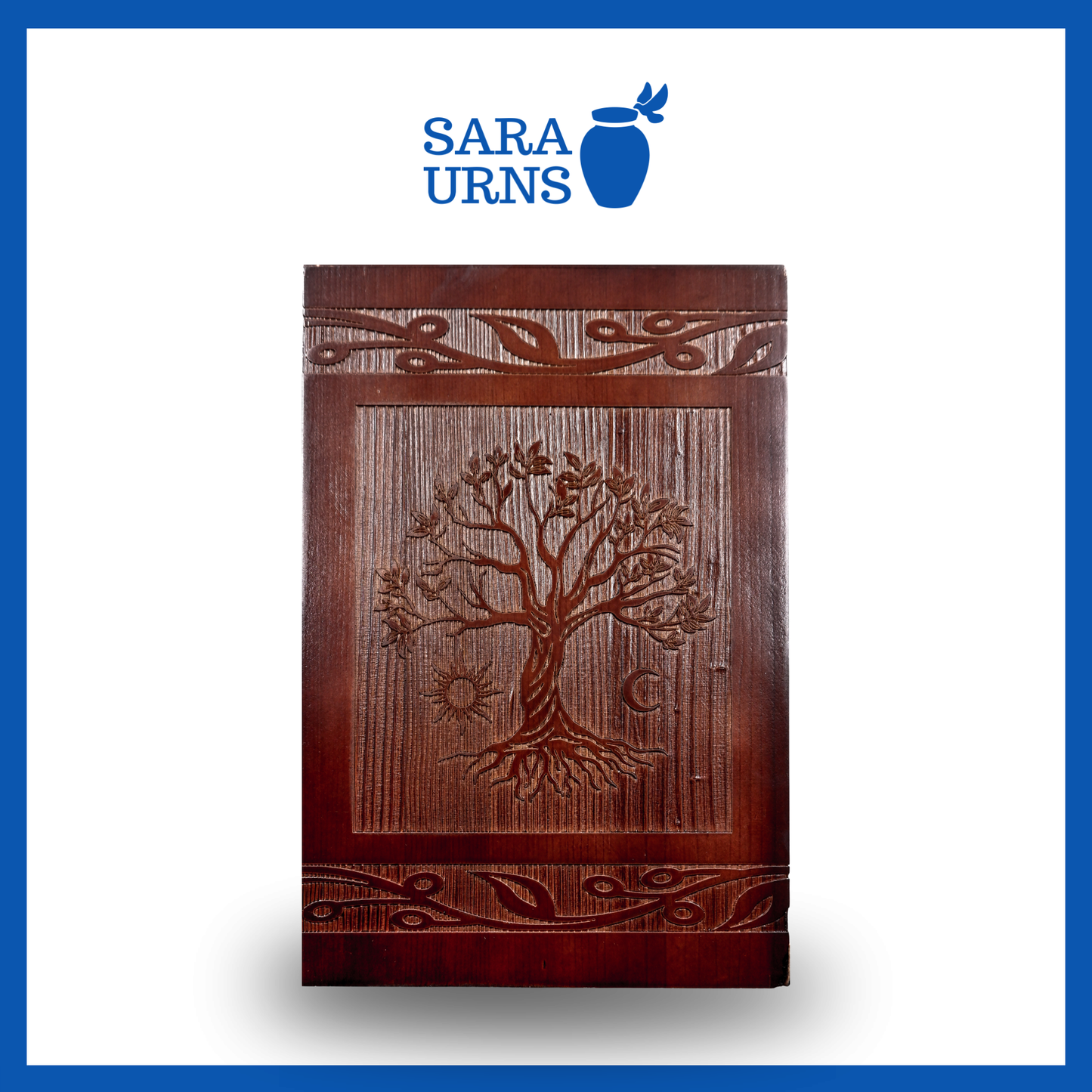 A front-facing shot of a brown pine wooden urn with an intricate engraving of the tree of life over a white background.