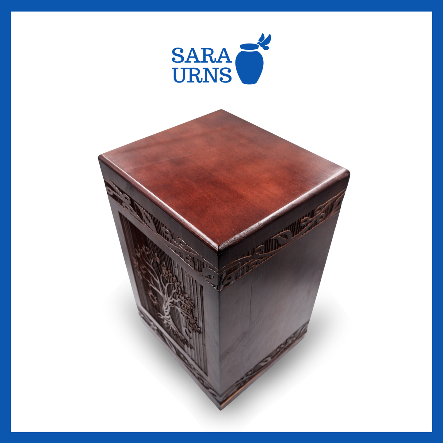 A second, higher angle of a brown pine wooden urn with an intricate engraving of the tree of life over a white background.