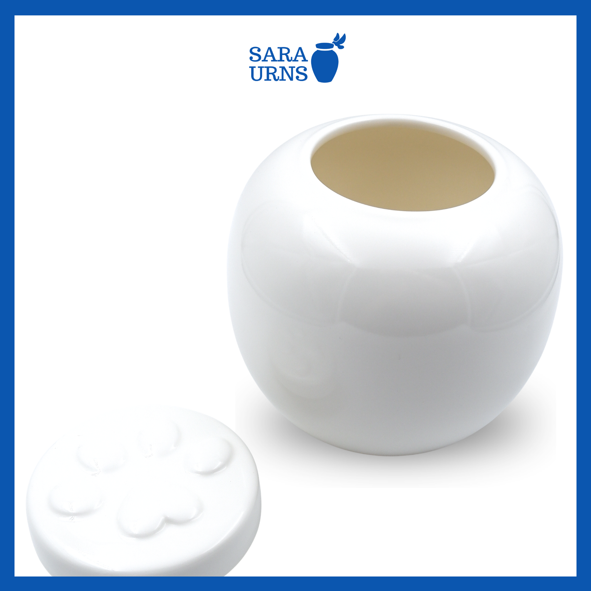 An open white ceramic pet urn with a polished finish with its lid placed beside it.