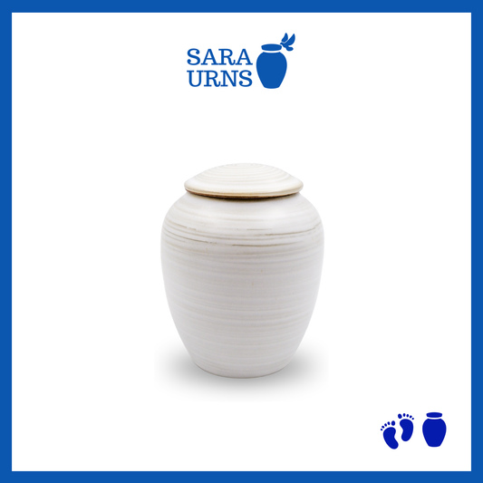 A white polished ceramic baby urn inspired by traditional, Japanese ceramics over a white background.