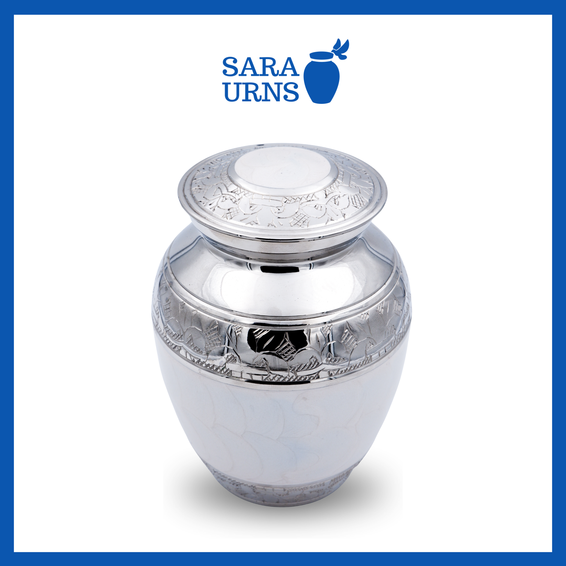 A higher angle of a white polished brass metal baby urn with an enamel finish and silver hand-etched details over a white background.