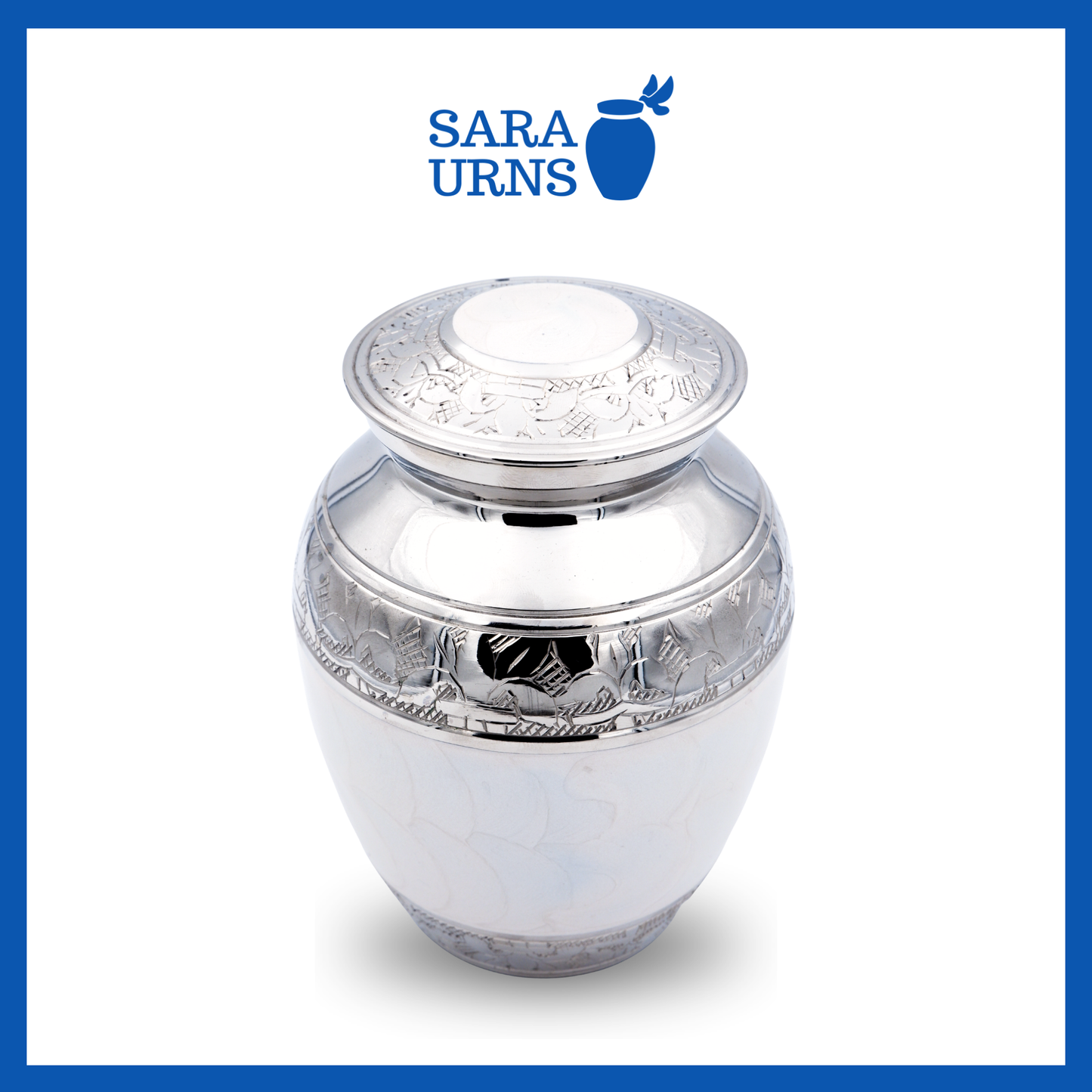 A higher angle of a white polished brass metal baby urn with an enamel finish and silver hand-etched details over a white background.